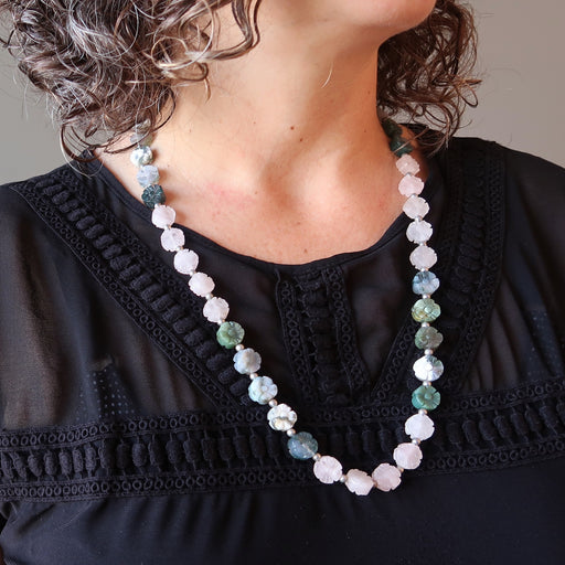 woman modeling a rose quartz moss agate flower necklace
