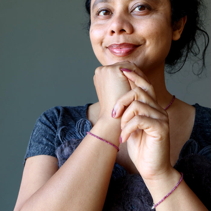 woman wearing ruby jewelry