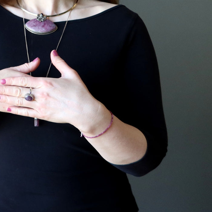 woman wearing ruby jewelry