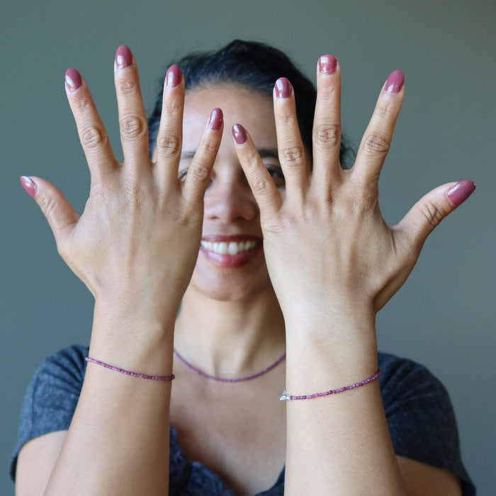 woman wearing ruby jewelry