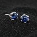 sapphire earrings in black sand