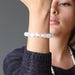 woman modeling selenite bracelet