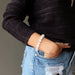 selenite bracelet on wrist 