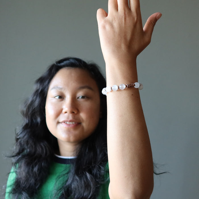 jessica of satin crystals wearing white selenite and antique beads stretch bracelet