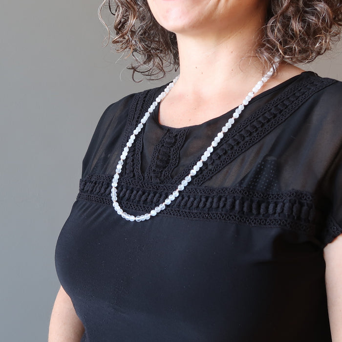 white selenite necklace on female