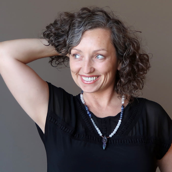 aleks of satin crystals wearing selenite goddess necklace