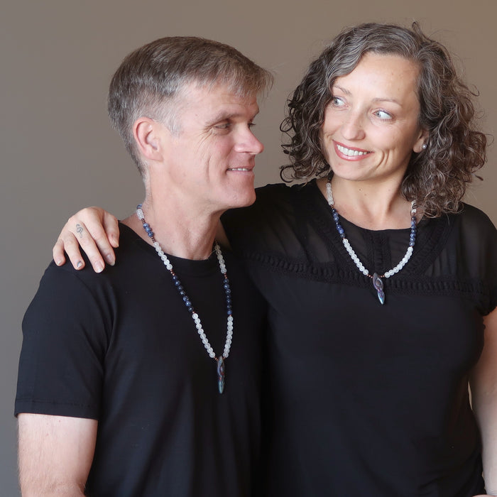 male and female wearing selenite sodalite goddess necklace