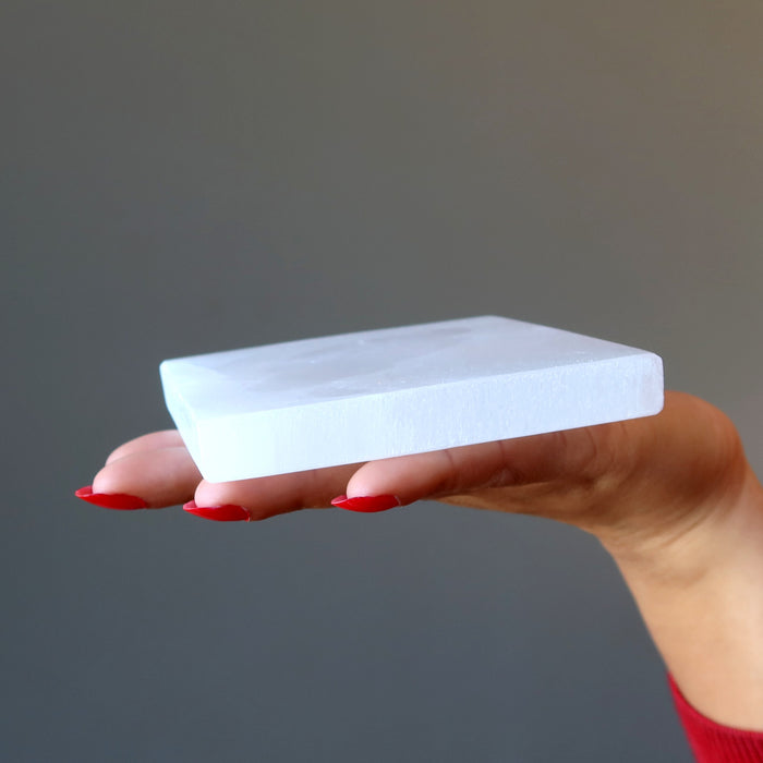 selenite charging station in hand