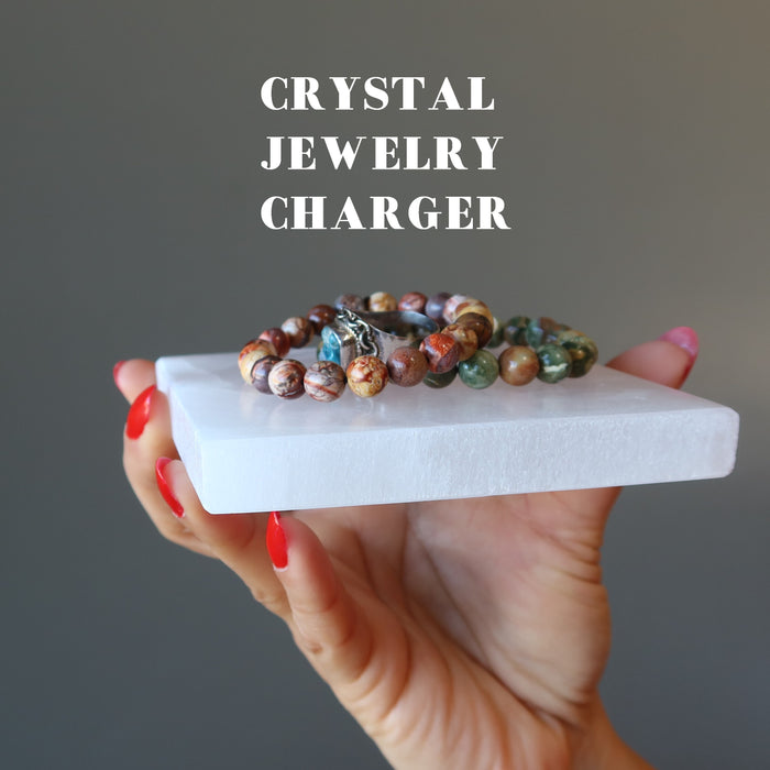 selenite charging station with jewelry