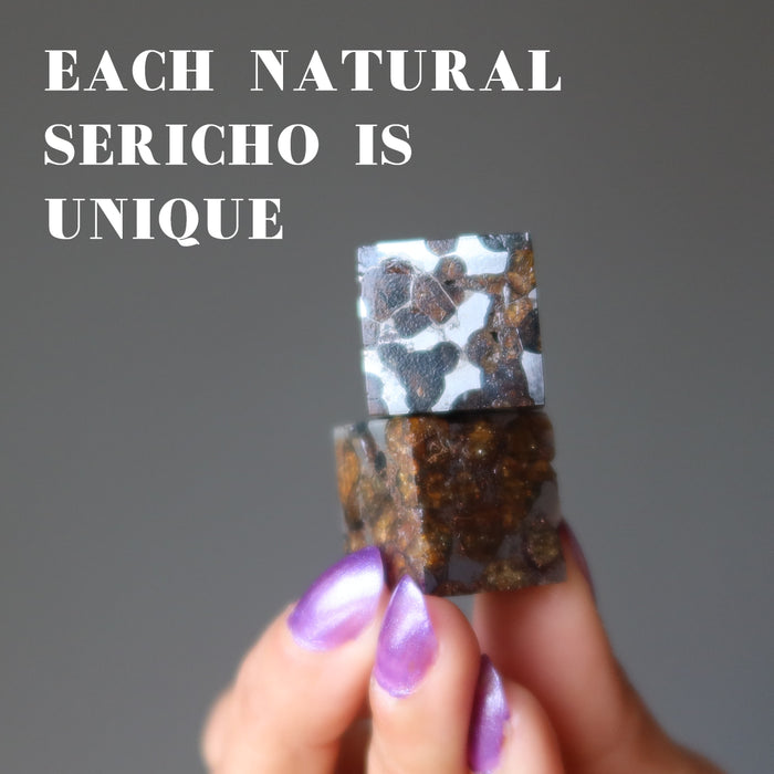 two silver and orange sericho meteorite cubes showing each is unique