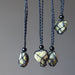 serpentine tumbled stone in macrame necklaces