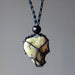 serpentine tumbled stone in macrame necklace
