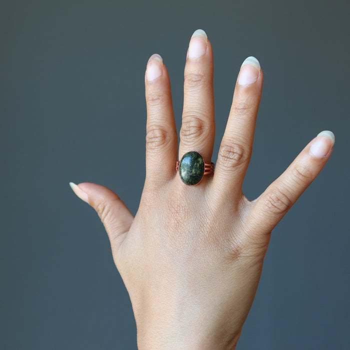 hand modeling serpentine copper ring