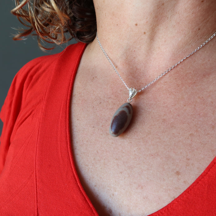 shiva lingam necklace on female model