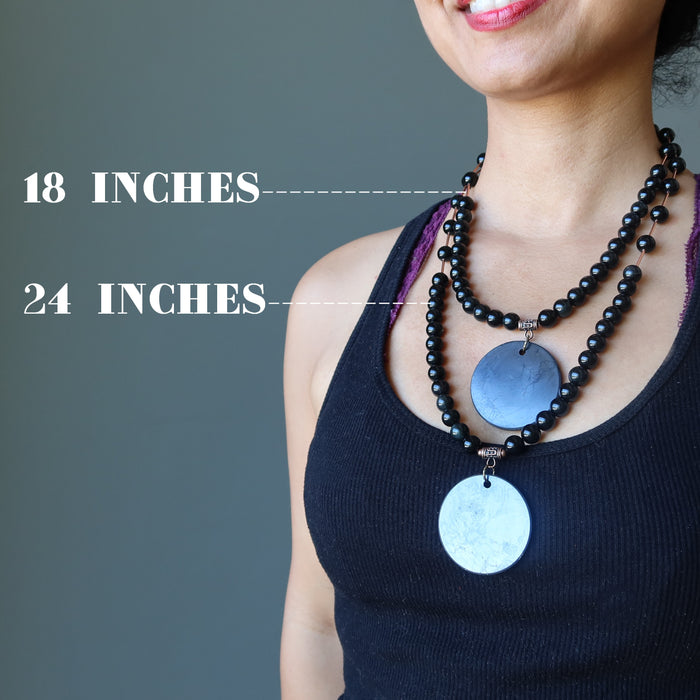 sheila of satin crystals wearing two shungite and rainbow obsidian beaded necklaces showing 18 and 24 inch lengths