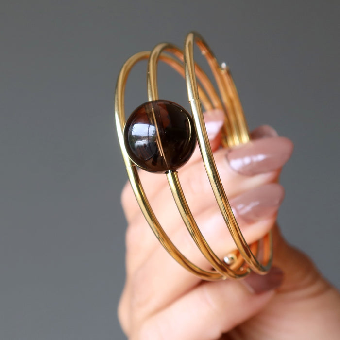 hand holding Smoky Quartz Bracelet
