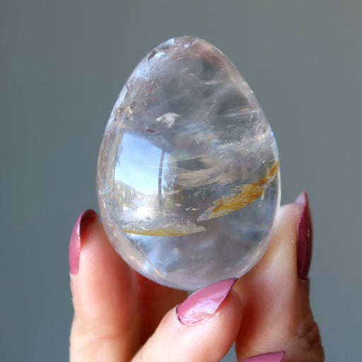 holding Smoky Quartz Egg