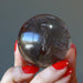 holding Smoky Quartz Sphere