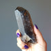 holding Smoky Quartz Point Wand