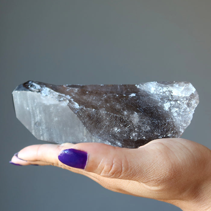 Smoky Quartz Point Wand on the palm
