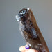 holding Smoky Quartz Point Wand