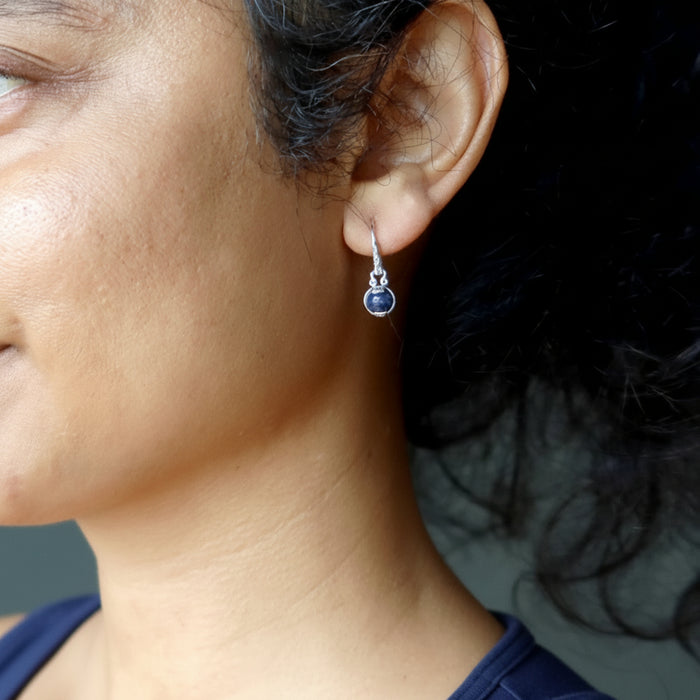 sodalite earrings on woman