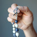 hand holding Sodalite Magnesite Necklace showing the cheart shaped toggle clasp