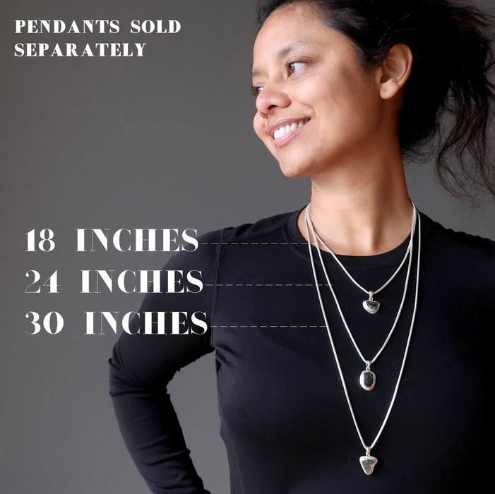 woman layered with sterling silver snake chains