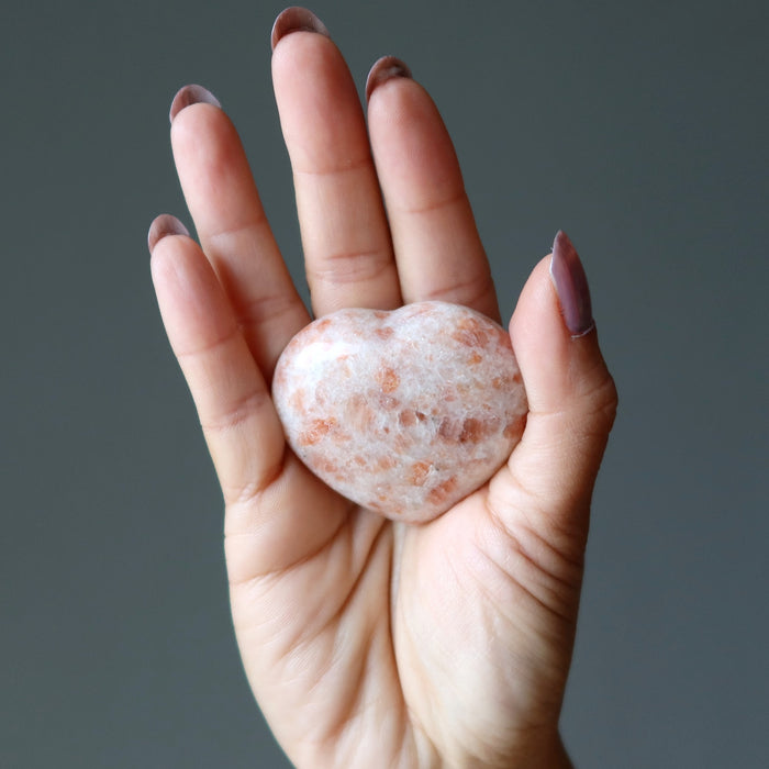 palm holding Sunstone Heart 