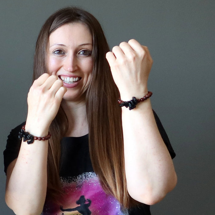 female model wearing tektite obsidian bracelets and satin crystals shirt