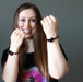female model wearing tektite obsidian bracelets and satin crystals shirt