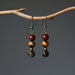 holding Tigers Eye Earrings 