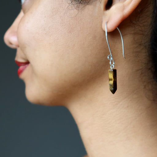 sheila of satin crystals wearing tigers eye point fine silver earrings