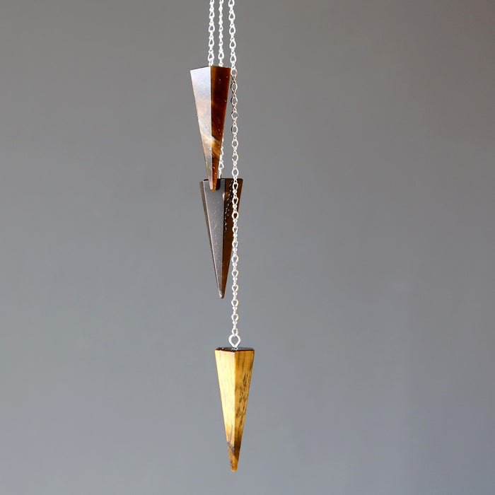 three tigers eye pendulums