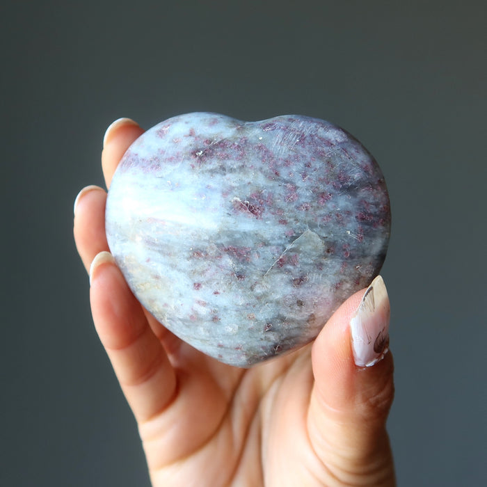 rubellite tourmaline heart in hand