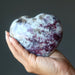 rubellite tourmaline heart in hand
