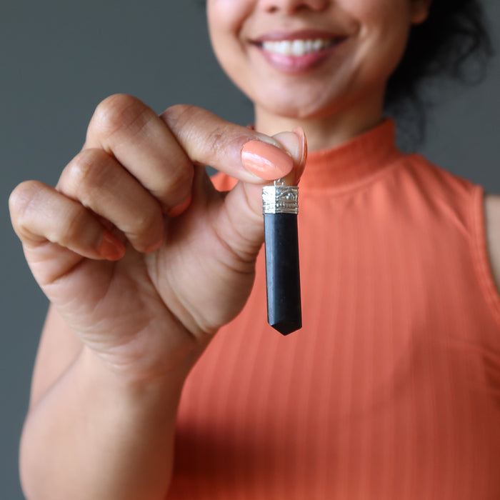 sheila of satin crystals holding Black Tourmaline point Pendant 