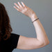 jamie of satin crystals wearing a tourmaline bracelet