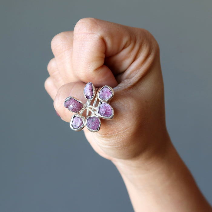 pink tourmaline sterling silver ring on thumb