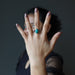 sheila of satin crystals wearing turquoise ring