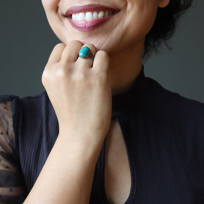 sheila of satin crystals wearing turquoise ring