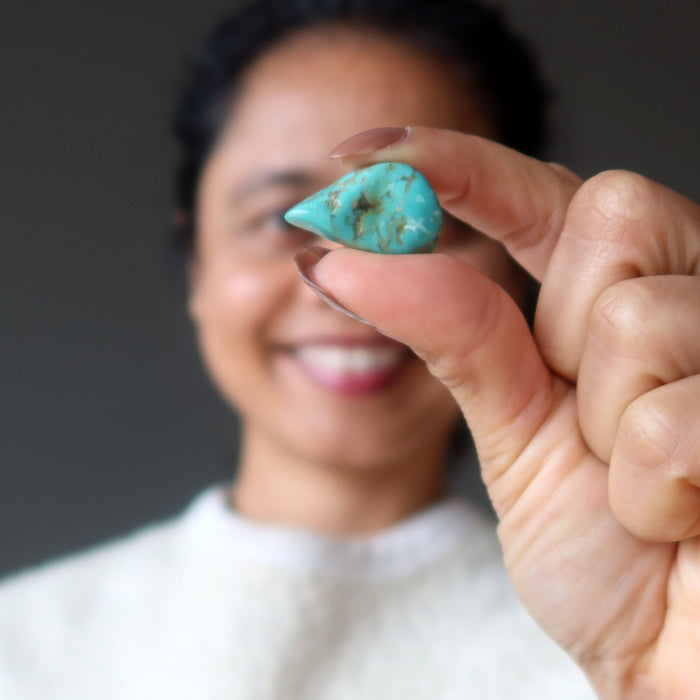tumbled turquoise at third eye chakra