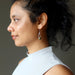 sheila of satin crystals wearing unakite earrings