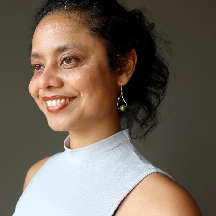 sheila of satin crystals wearing unakite earrings